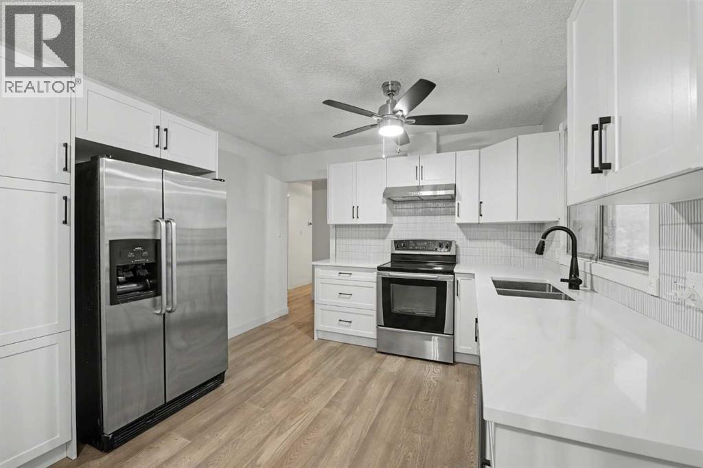 711 118 Avenue Sw, Calgary, Alberta  T2W 0E6 - Photo 4 - A2339415