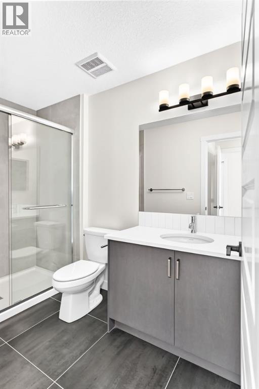 1075 Bayview Crescent SW, Airdrie, Alberta  T4B 5N8 - Photo 12 - A2338048