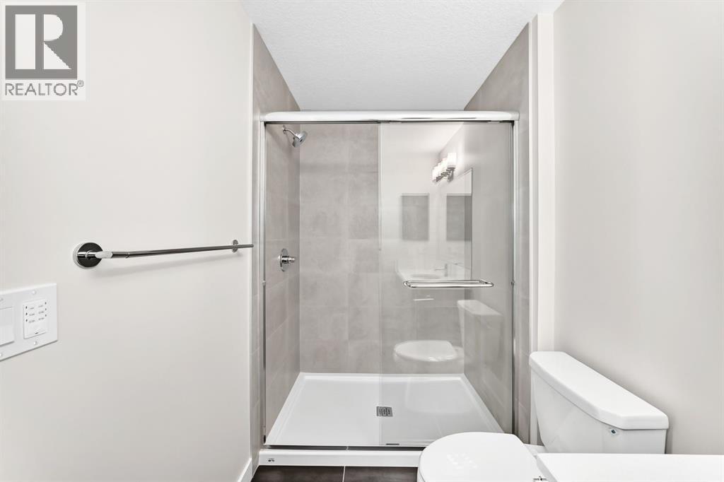1075 Bayview Crescent SW, Airdrie, Alberta  T4B 5N8 - Photo 13 - A2338048