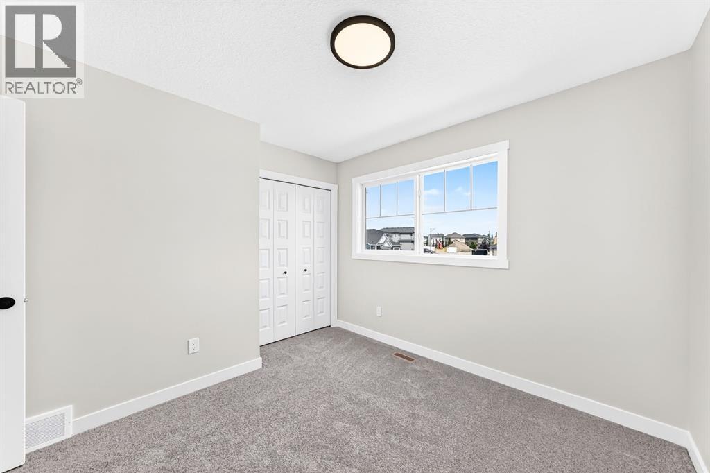 1075 Bayview Crescent SW, Airdrie, Alberta  T4B 5N8 - Photo 23 - A2338048