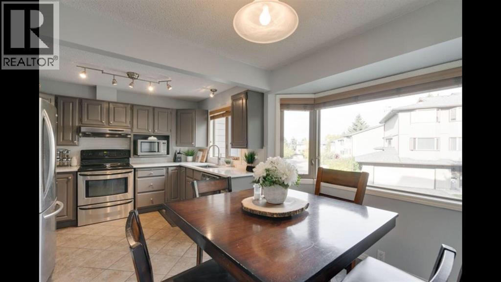 164 Glamis Terrace Sw, Calgary, Alberta  t3e 6v3 - Photo 6 - A2339132