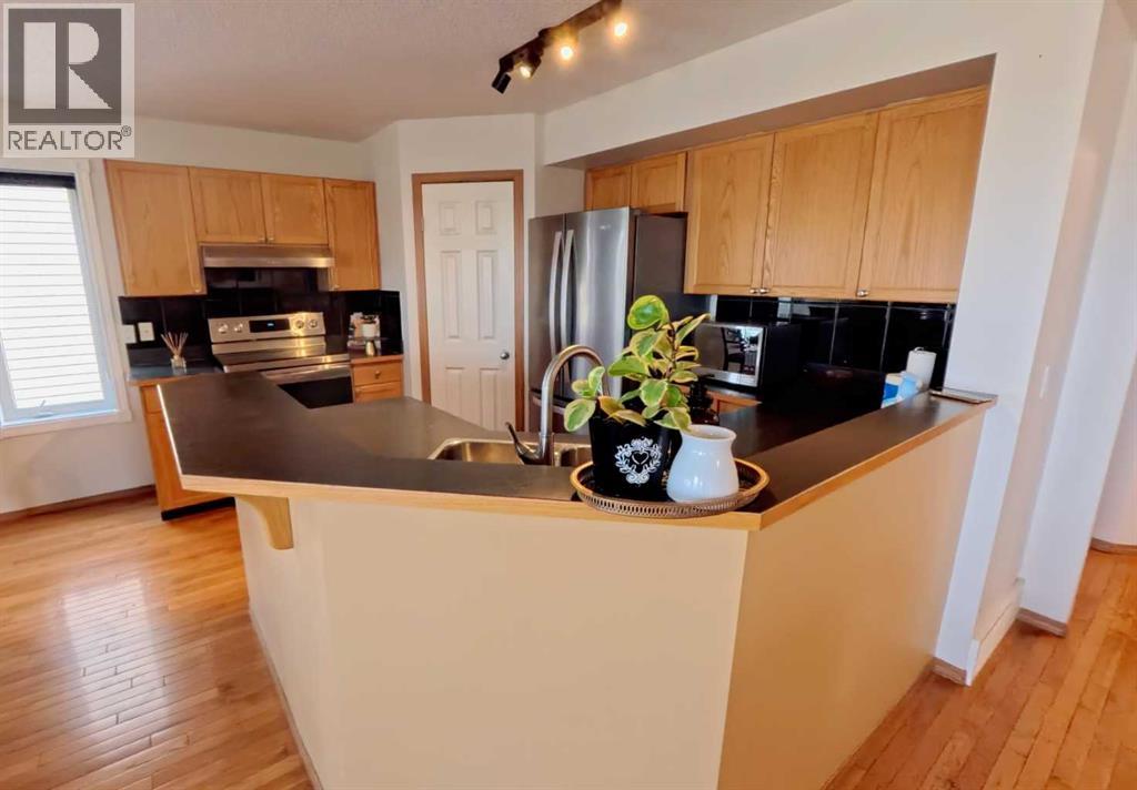 210 Panamount Hill NW, Calgary, Alberta  T3K 5P5 - Photo 10 - A2330714
