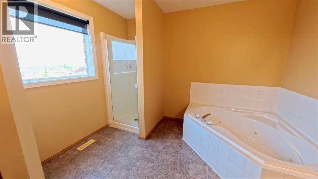 210 Panamount Hill NW, Calgary, Alberta  T3K 5P5 - Photo 23 - A2330714