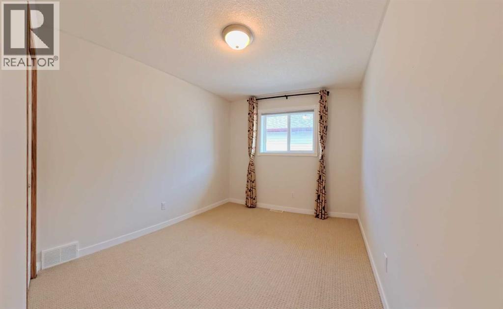 210 Panamount Hill NW, Calgary, Alberta  T3K 5P5 - Photo 21 - A2330714