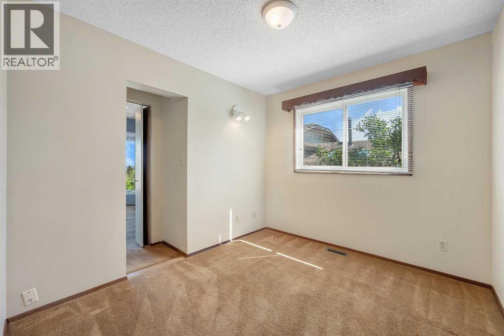 124 Macewan Drive NW, Calgary, Alberta  T3K 2P7 - Photo 23 - A2338025