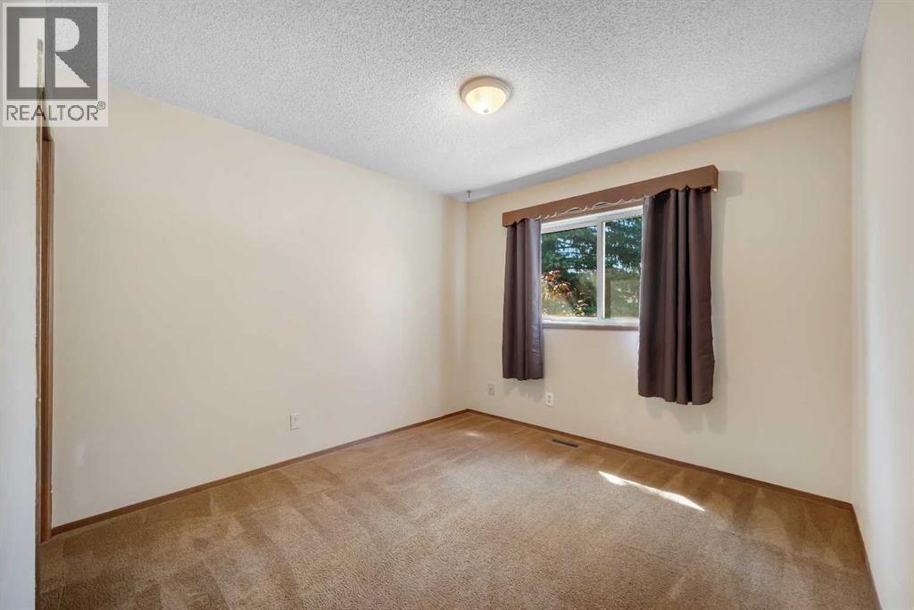 124 Macewan Drive NW, Calgary, Alberta  T3K 2P7 - Photo 26 - A2338025