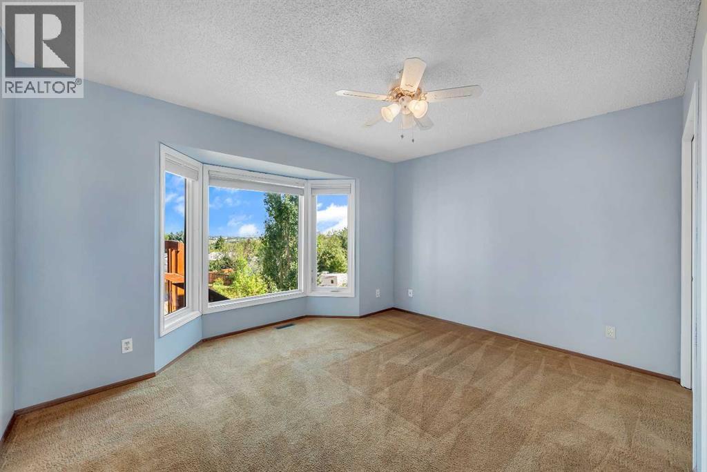 124 Macewan Drive NW, Calgary, Alberta  T3K 2P7 - Photo 18 - A2338025