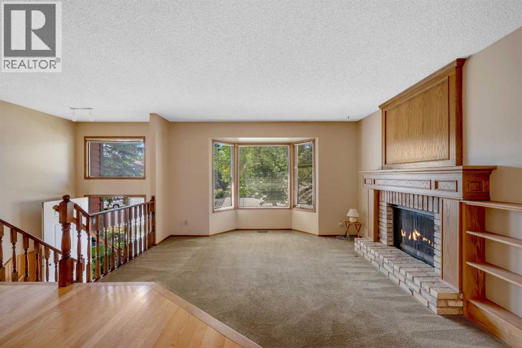 124 Macewan Drive NW, Calgary, Alberta  T3K 2P7 - Photo 6 - A2338025