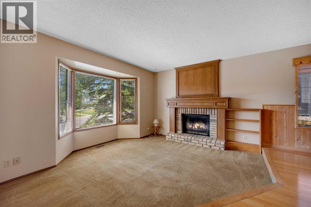 124 Macewan Drive NW, Calgary, Alberta  T3K 2P7 - Photo 5 - A2338025
