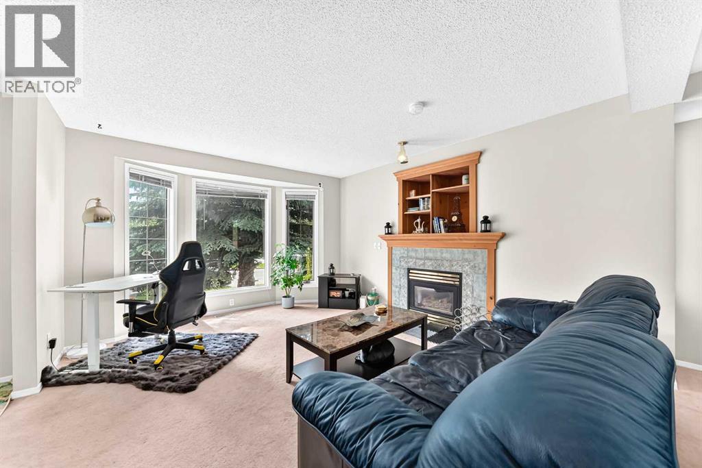 7212 Sierra Morena Boulevard SW, Calgary, Alberta  T3H 3G5 - Photo 4 - A2308935