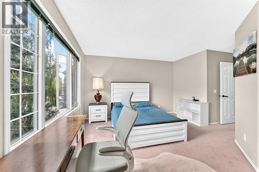 7212 Sierra Morena Boulevard SW, Calgary, Alberta  T3H 3G5 - Photo 21 - A2308935