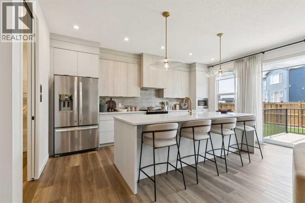 27 Belmont Place SW, Calgary, Alberta  T2X 5T6 - Photo 4 - A2331527