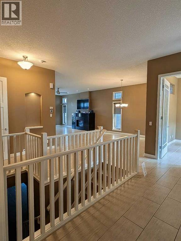 116 Bridle Estates Road SW, Calgary, Alberta  T2Y 0G1 - Photo 9 - A2325603