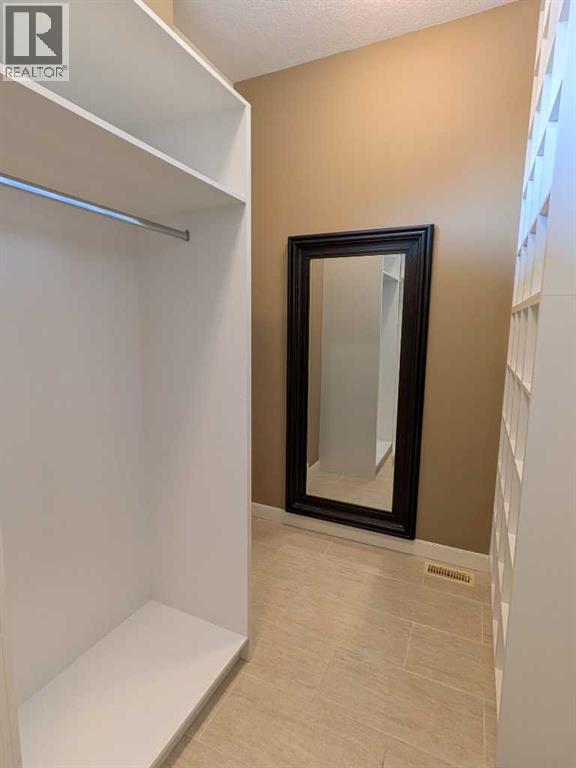 116 Bridle Estates Road SW, Calgary, Alberta  T2Y 0G1 - Photo 27 - A2325603