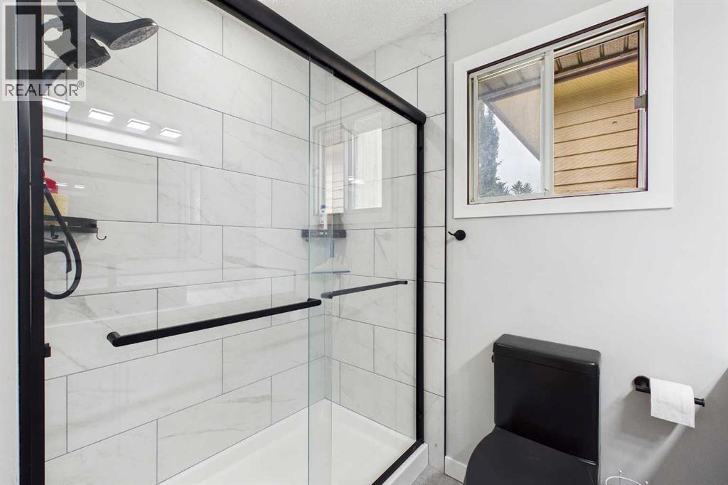 44 Woodbrook Place Sw, Calgary, Alberta  T2W 3Z4 - Photo 23 - A2335127