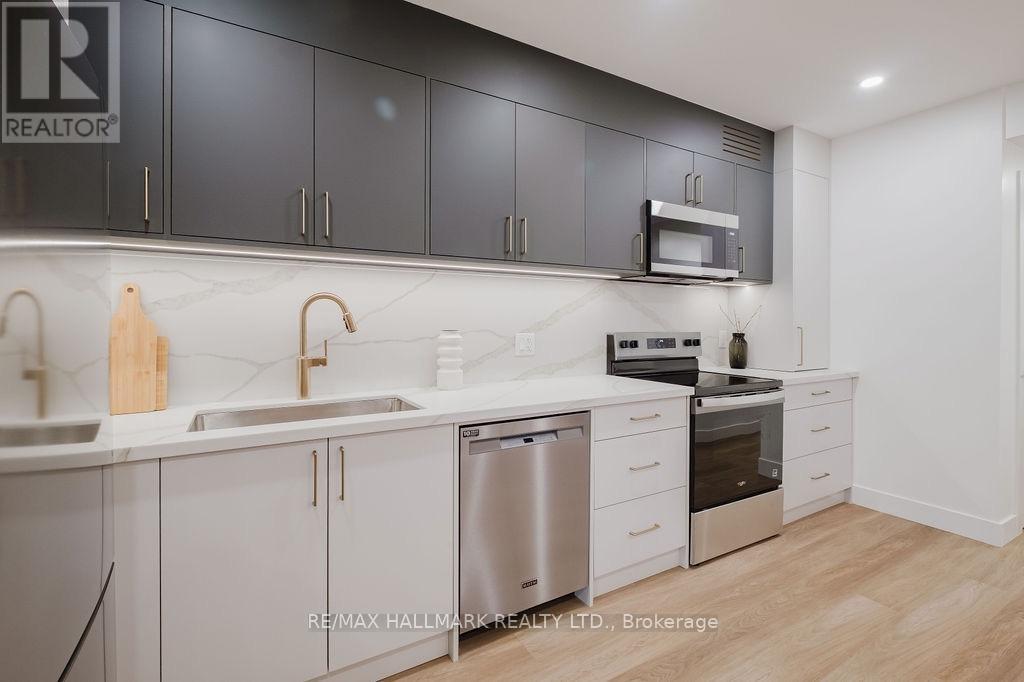 Lower - 37 Milverton Boulevard, Toronto, Ontario  M4J 1T5 - Photo 7 - E13704454