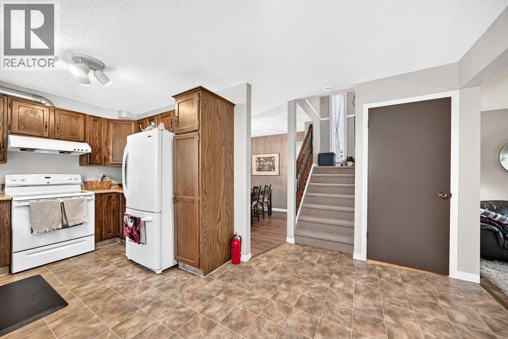 1487 Berkley Drive NW, Calgary, Alberta  T3K 1T7 - Photo 15 - A2337862