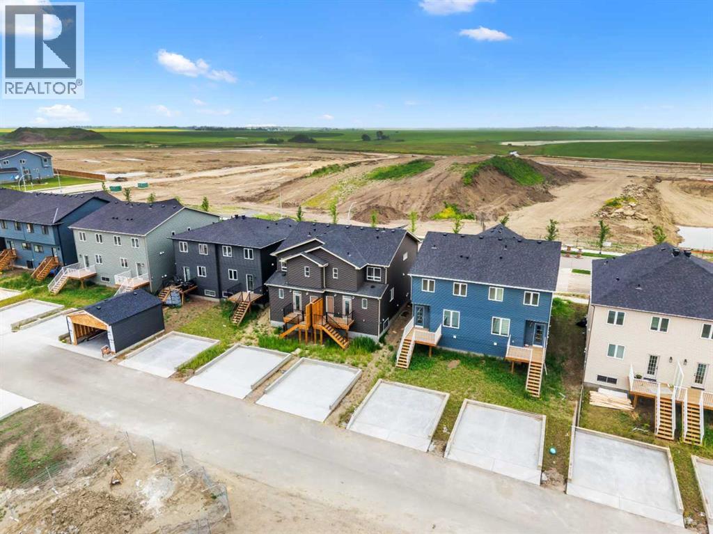 209 Bridgeport Gate N, Chestermere, Alberta  T1X 1V9 - Photo 40 - A2329630