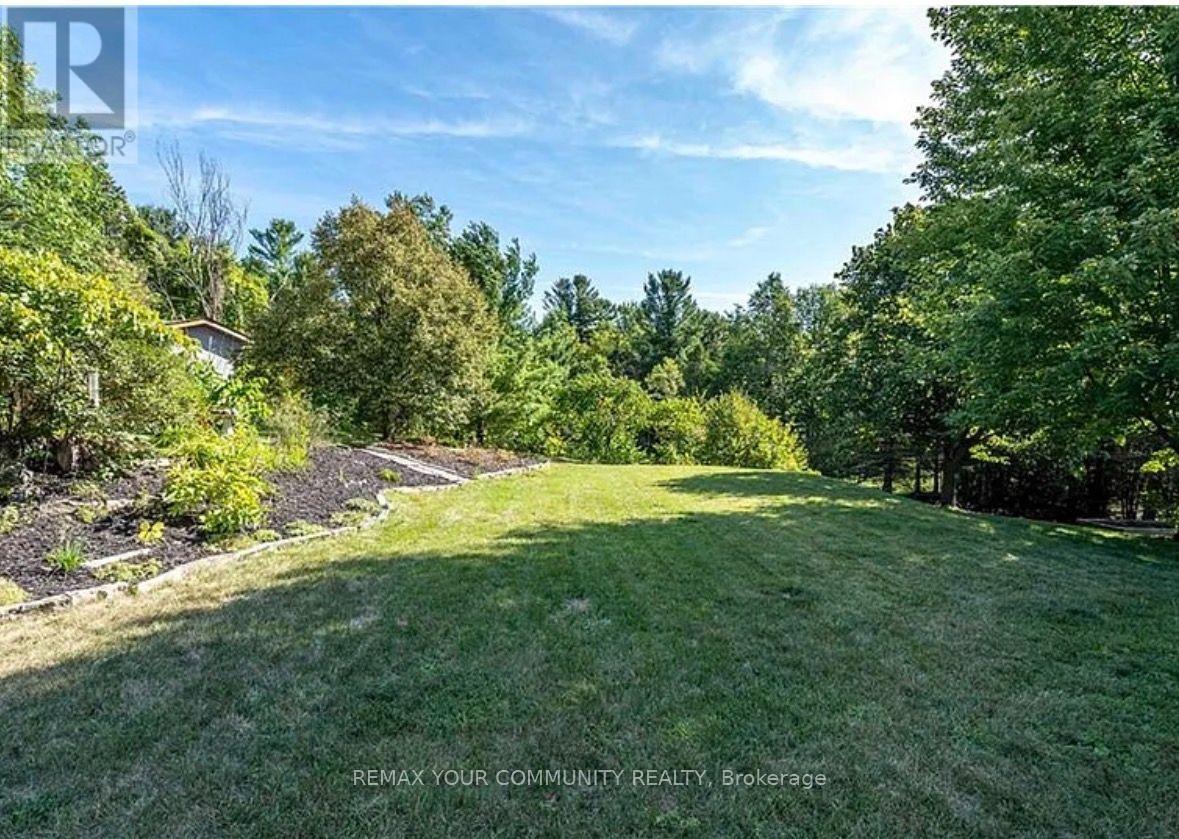 12 Cairns Boulevard, Springwater, Ontario  L0L 1X0 - Photo 3 - S13704894