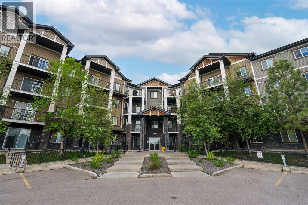 1113, 130 Panatella Street NW, Calgary, Alberta  T3K 0Y6 - Photo 1 - A2320044