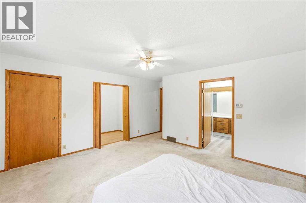 5 Sandpiper Gate NW, Calgary, Alberta  T3K 3T8 - Photo 16 - A2336352