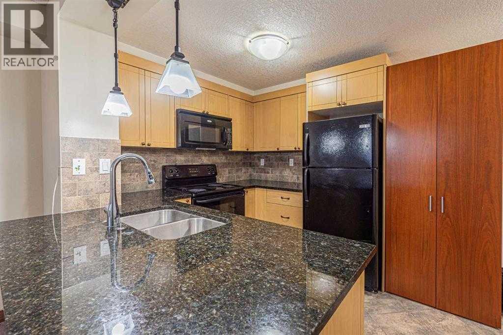 111, 920 68 Avenue SW, Calgary, Alberta  T2V 0N6 - Photo 2 - A2301159