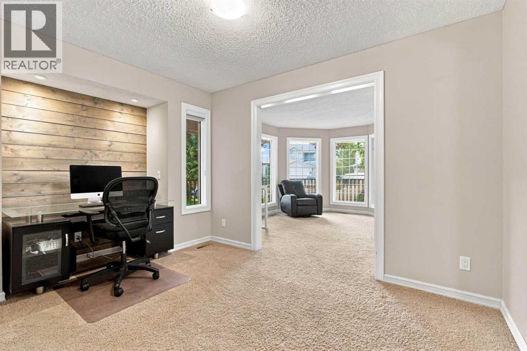 70 Sunset Way SE, Calgary, Alberta  T2X 3C1 - Photo 10 - A2338509