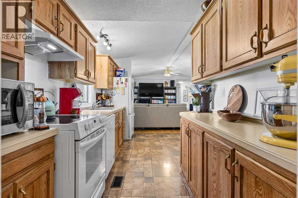 117 Sunset Way, High River, Alberta  T1V 1J4 - Photo 10 - A2313307