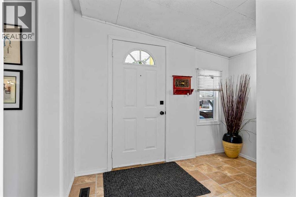 117 Sunset Way, High River, Alberta  T1V 1J4 - Photo 2 - A2313307