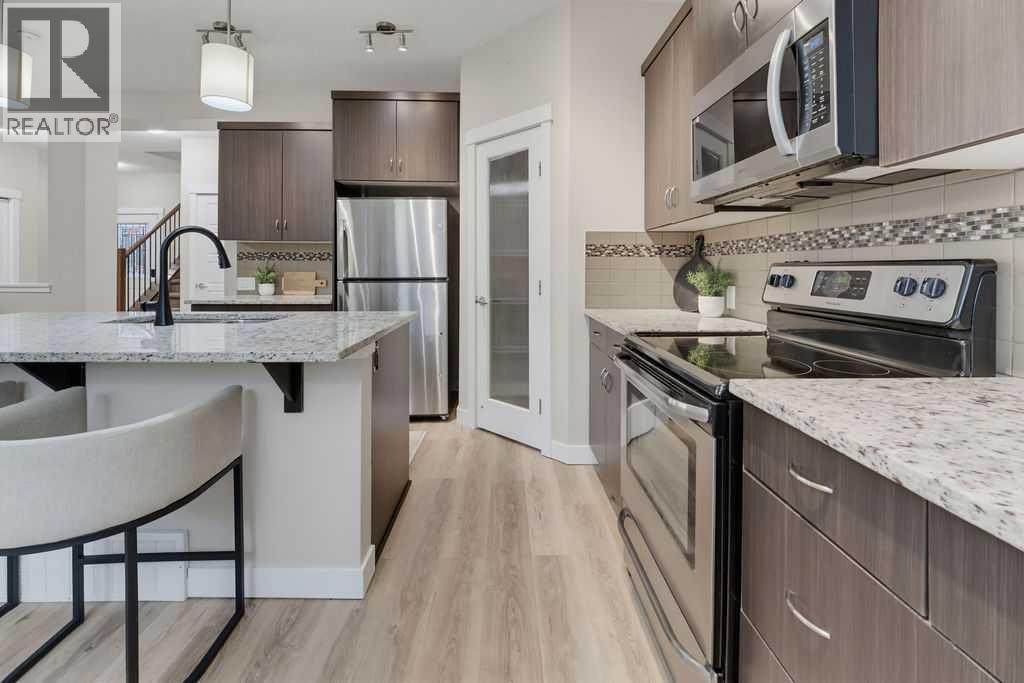 145 Sunset Manor, Cochrane, Alberta  T4C 0N2 - Photo 6 - A2339058