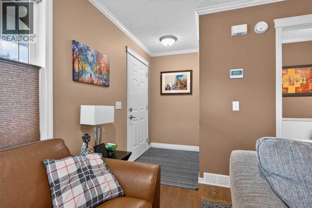 22 Panatella Park NW, Calgary, Alberta  T3K 6K4 - Photo 4 - A2324025