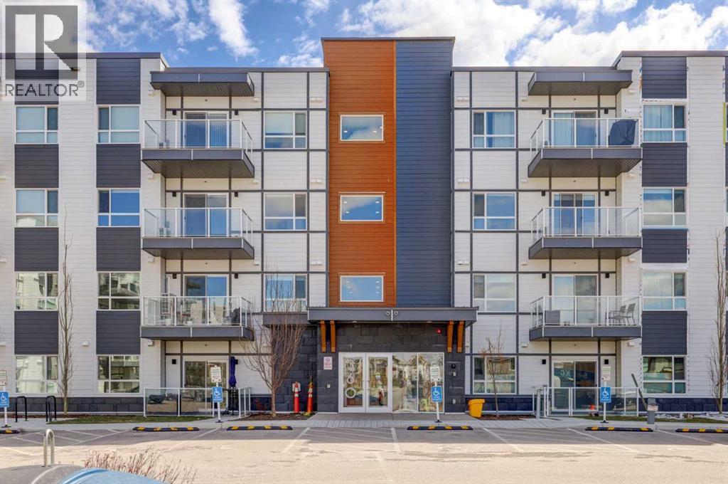 106, 360 Harvest Hills Way, Calgary, Alberta  T3K 2S1 - Photo 1 - A2305063