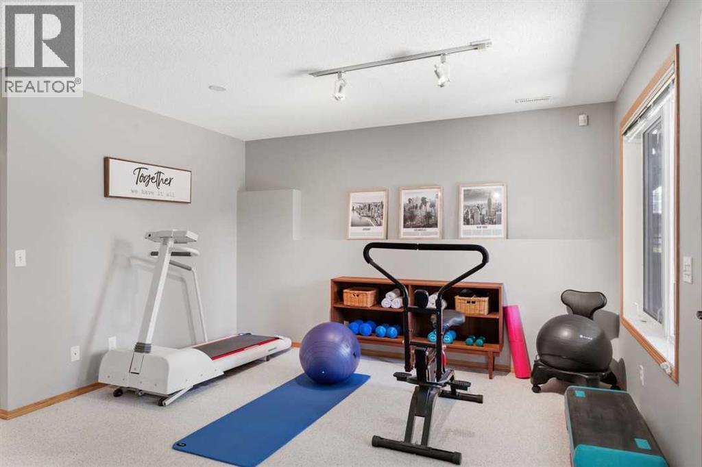 545 Rocky Ridge Bay Nw, Calgary, Alberta  T3G 4E7 - Photo 27 - A2308309