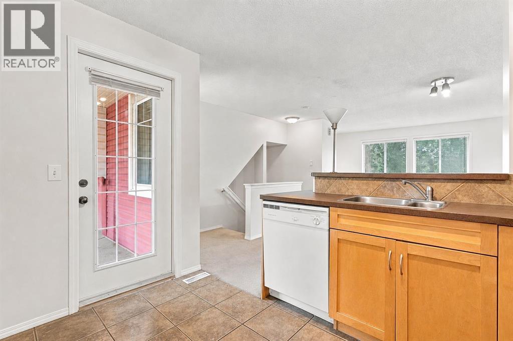 106 Panamount Drive NW, Calgary, Alberta  T3K 6K3 - Photo 8 - A2338019
