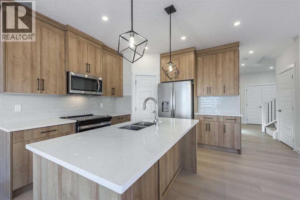 126 Sandpiper Bend, Chestermere, Alberta  T1X 2S8 - Photo 4 - A2334806