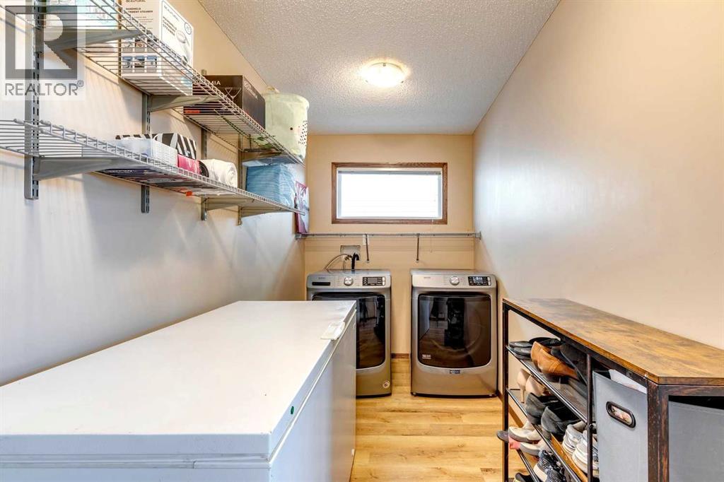 203 Bishop Mews NW, Langdon, Alberta  T0J 1X2 - Photo 19 - A2324278