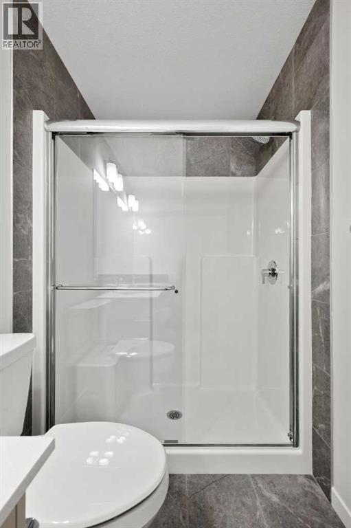 109 Creekview Manor Sw, Calgary, Alberta  T2X 5Y1 - Photo 27 - A2339304