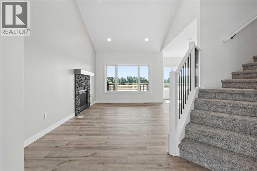 57 Malloy Terrace, Coaldale, Alberta  T1M 0G7 - Photo 3 - A2337083