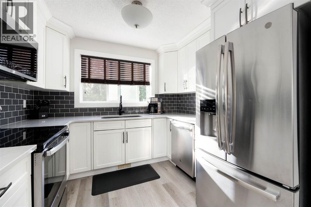 1041 Timberline Drive, Fort Mcmurray, Alberta T9K 1A8 - Photo 3 - A2320194