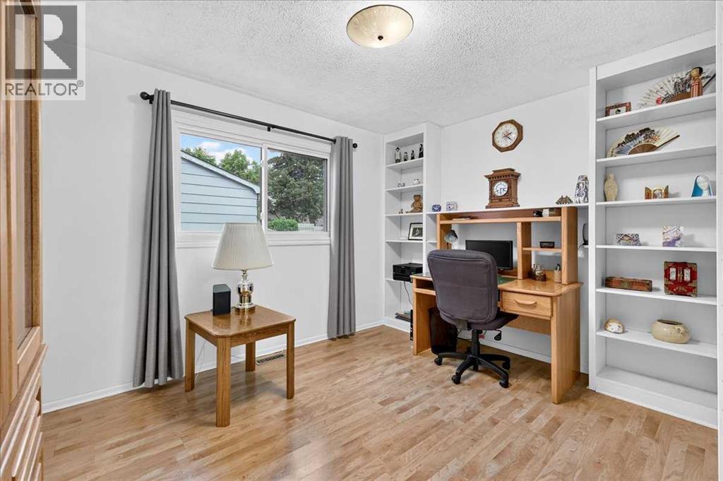 1707 107 Avenue Sw, Calgary, Alberta  T2W 0C3 - Photo 24 - A2337078