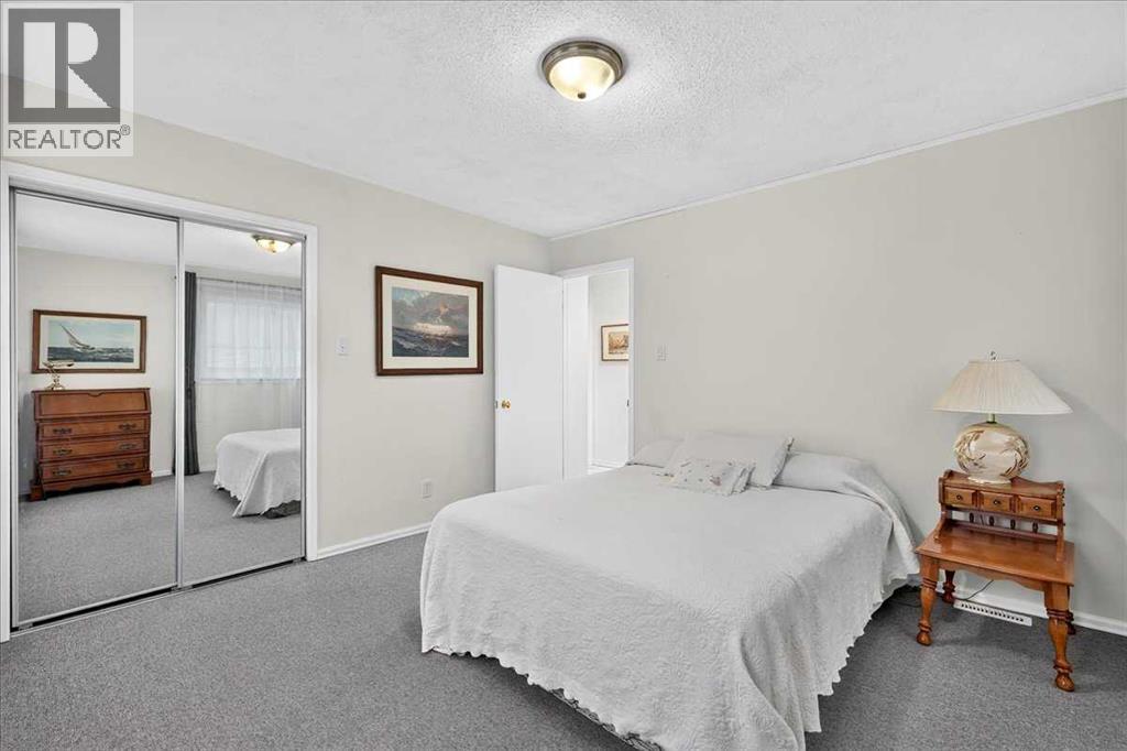 1707 107 Avenue Sw, Calgary, Alberta  T2W 0C3 - Photo 21 - A2337078