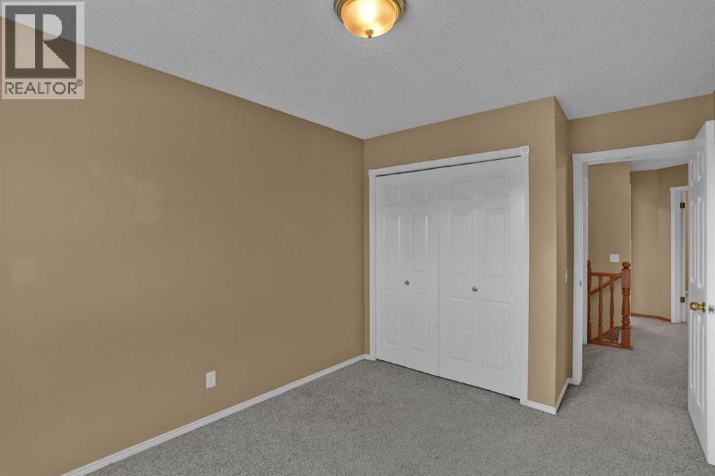 62 West Mitford Crescent, Cochrane, Alberta  T4C 1L2 - Photo 37 - A2338724
