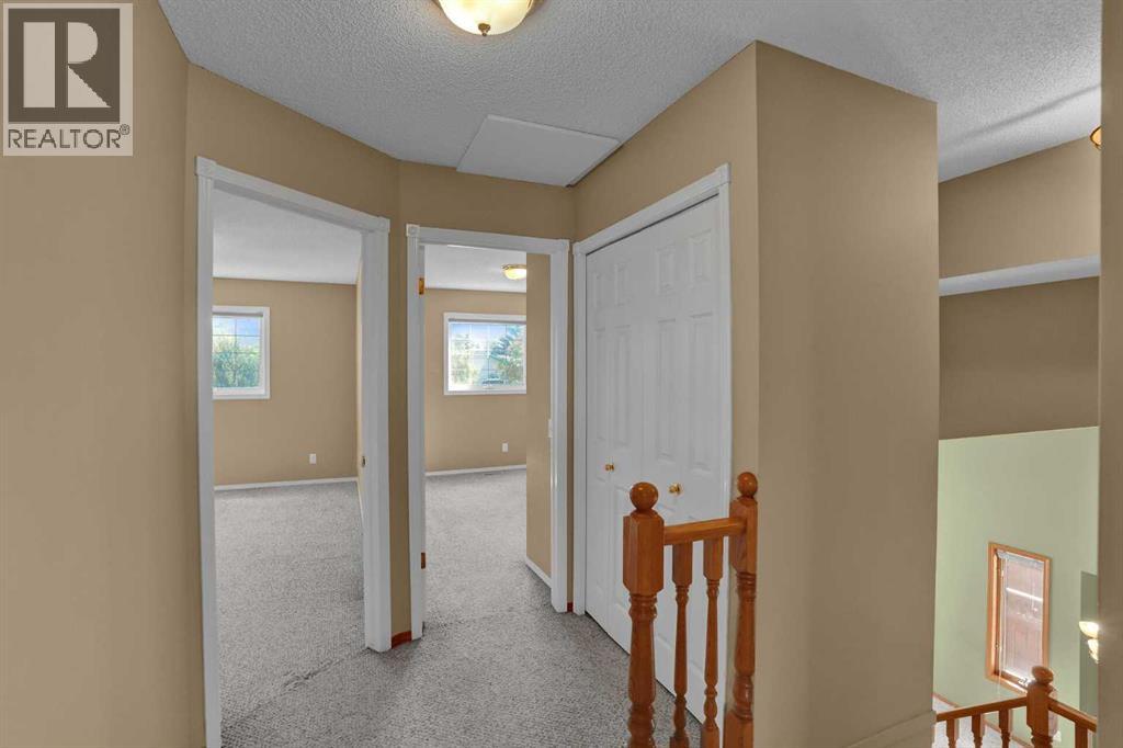 62 West Mitford Crescent, Cochrane, Alberta  T4C 1L2 - Photo 35 - A2338724