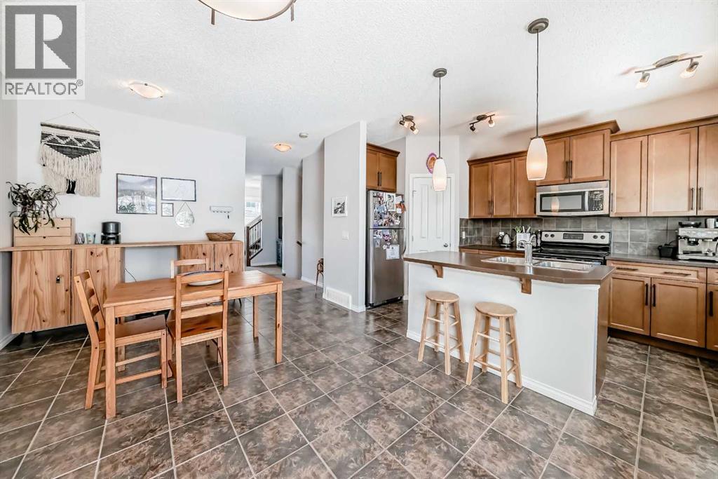 296 Sunset Point, Cochrane, Alberta T4C 0K8 - Photo 8 - A2338909
