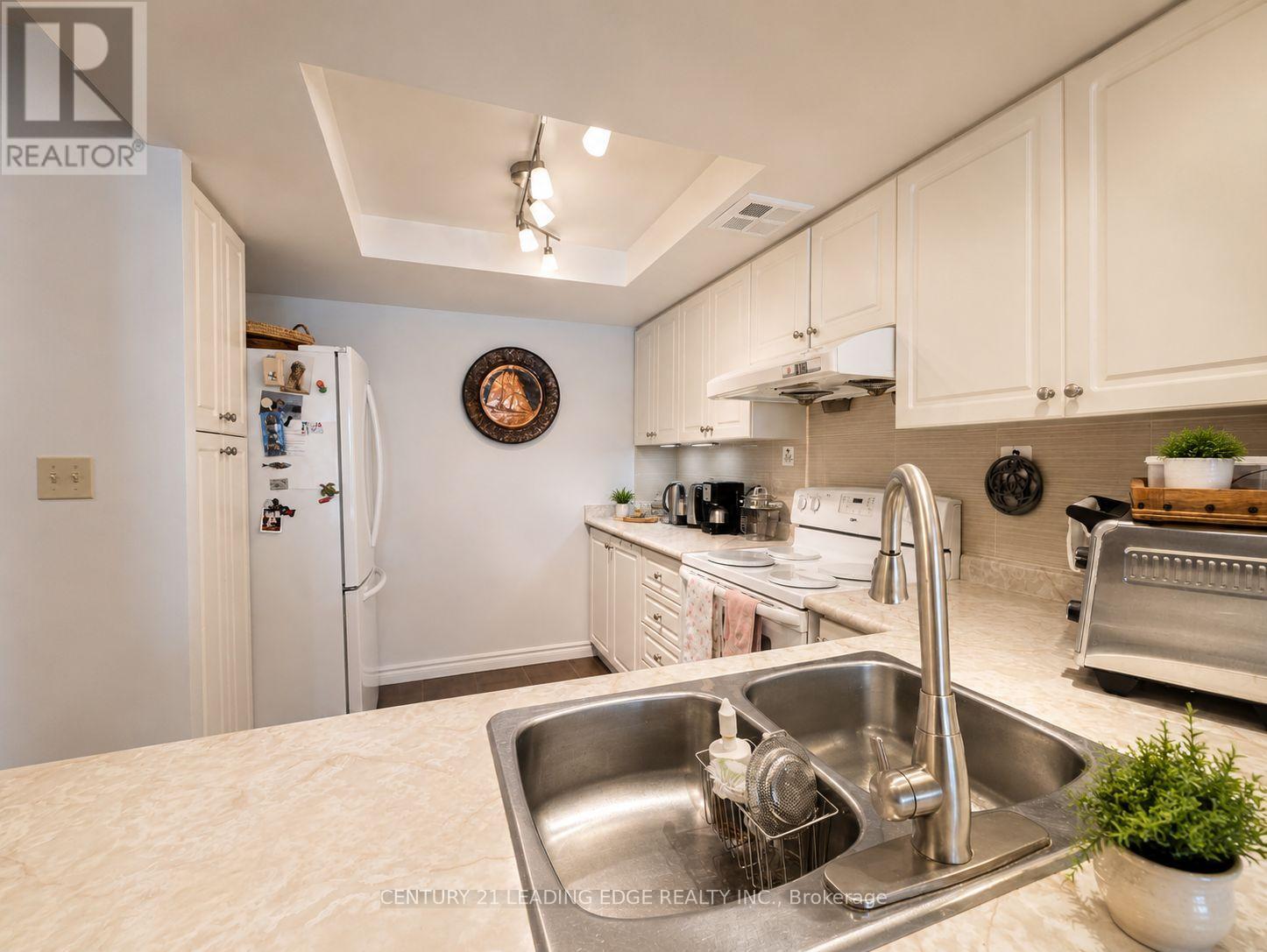310 - 275 Bamburgh Circle, Toronto, Ontario  M1W 3X4 - Photo 9 - E13707598