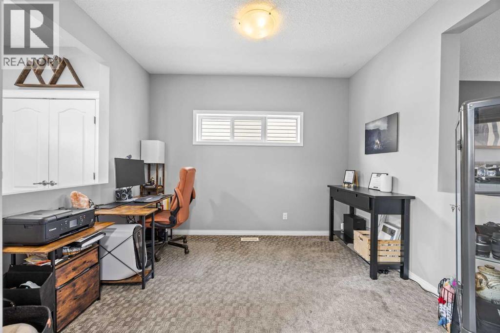 82 Cimarron Grove Close, Okotoks, Alberta  T1S 0H5 - Photo 3 - A2336950