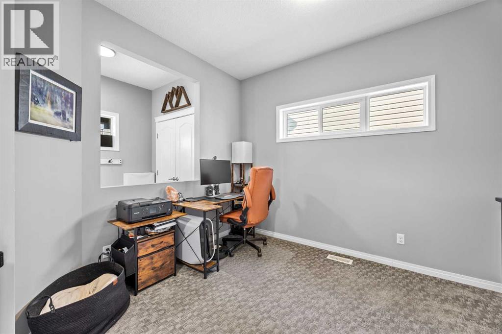 82 Cimarron Grove Close, Okotoks, Alberta  T1S 0H5 - Photo 4 - A2336950