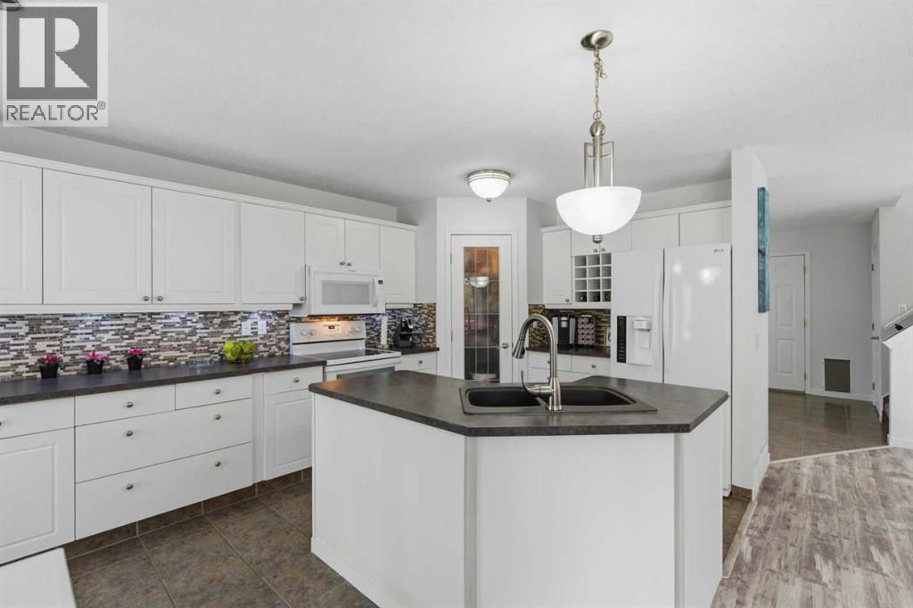 218 Bridlewood Place SW, Calgary, Alberta  T2Y 3P9 - Photo 7 - A2329247