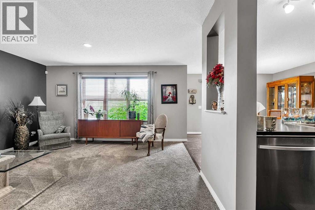 128 Reunion Mews Nw, Airdrie, Alberta  T4B 0J5 - Photo 3 - A2324807