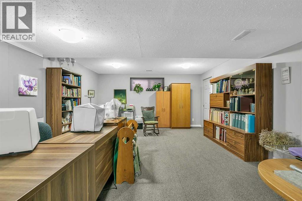 128 Reunion Mews Nw, Airdrie, Alberta  T4B 0J5 - Photo 33 - A2324807